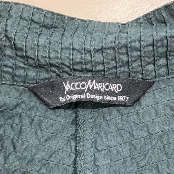 ヤッコマリカルド タグ ヤッコマリカルドのブランドタグのアップ