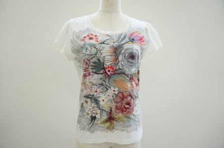 ヒロココシノの花柄を大胆にキャンバスへ描いたようなプリントTシャツを買取しました