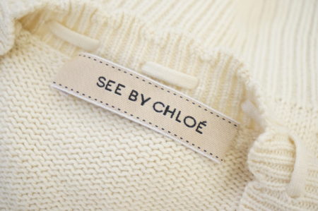 シーバイクロエのビッグボタンリボン付デザインカーディガン