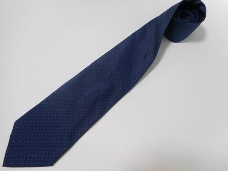 シンプルな装いに花を添えてくれる、ジバンシィの紺色ピンドットネクタイを買取致しました。