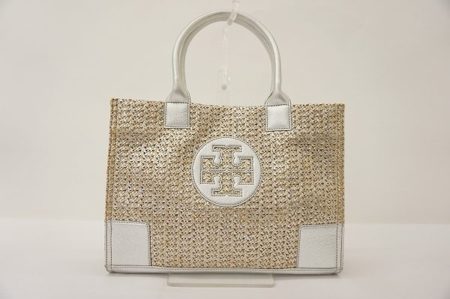 シルバーのレザー使いがクールで都会的。トリーバーチのかごトートバックをお売り頂きました