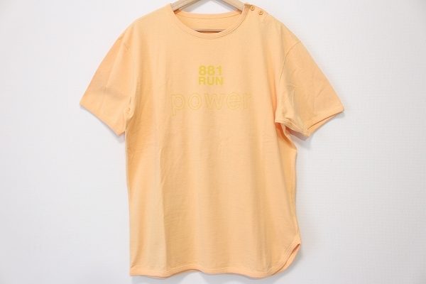 爽やかなオレンジ色で、肩ボタンがアクセントのパパス（Papas）のＴシャツを宅配買取にてお売り頂きました