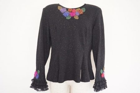 ぽってりとしたフラワーモチーフが可愛いノンノンドールのトップスを買い取りました