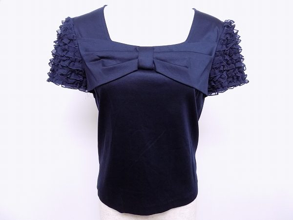 デコルテ周りのリボンで可愛らしさもアップ！コージワタナベのトップスを買取しました