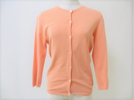 清楚なオレンジで顔映りもアップ！セオリーのカーディガンを買取しました