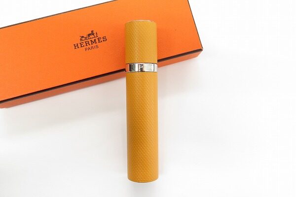 オレンジ×シルバーで高級感も!エルメスの香水ケースを買取しました