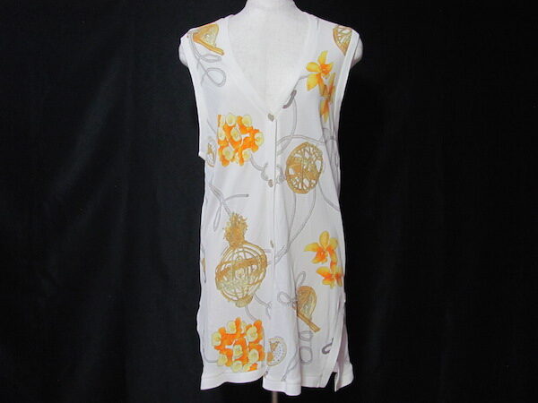 白地に映えるオレンジの総柄ロングジレを買取！レオナール