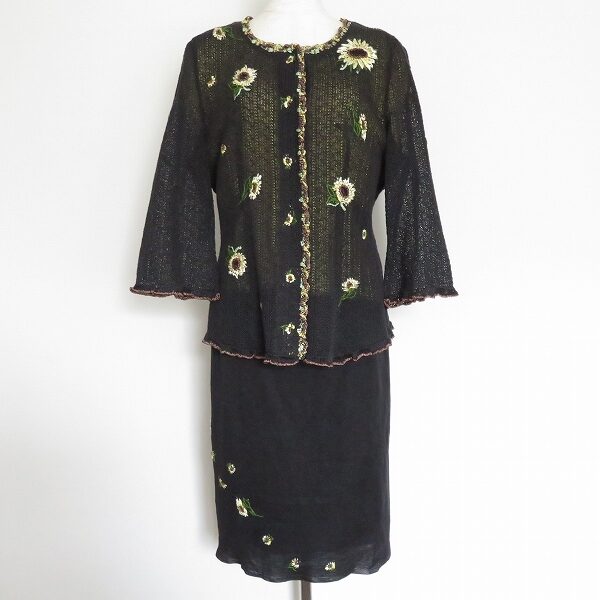 黒と黄色の花が溶け合う アトリエサガンのセットアップを買取しました