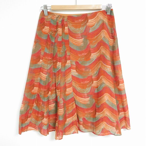 オレンジと緑のアートの様な柄に引き込まれる シビラのスカートを買取しました